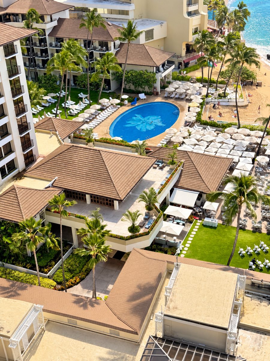 Halekulani, the pool, with its orchid mosaic, and the beach from above
