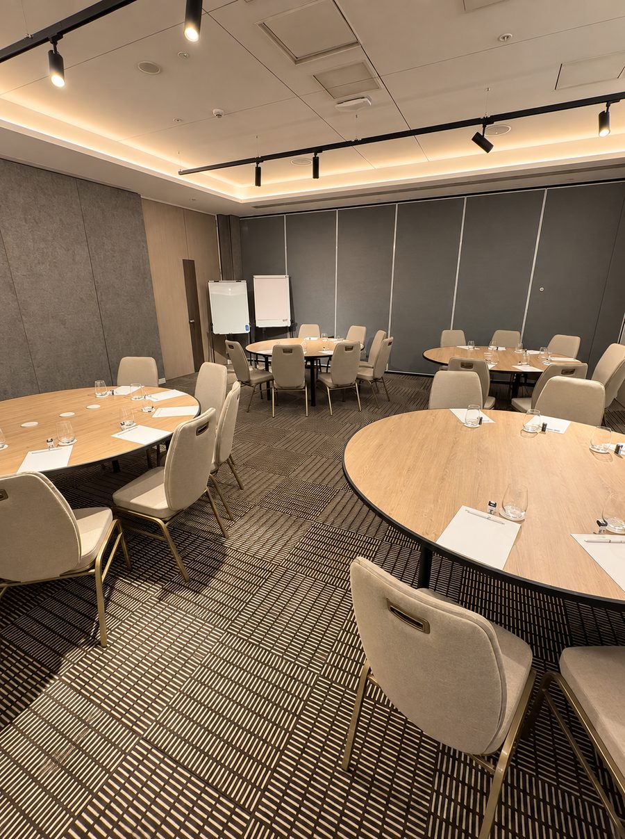 InterContinental Sydney Coogee Beach, meeting room set with round tables and flip charts